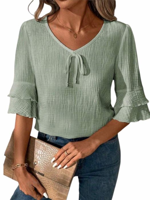 Gheata neagra cu cristale  Bluză lejeră din bumbac creponat cu volane – verde mentă pastel